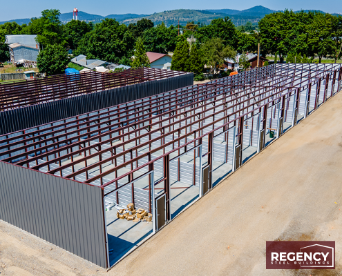 Steel self-storage building under construction with framing visible Steel self-storage building under construction with framing visible