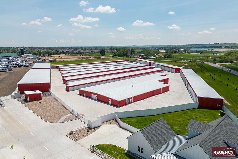 mini-storage-windsor image of mini storage buildings with red walls and white roofs