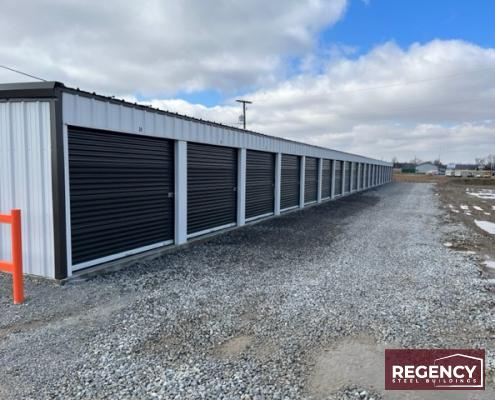 pair of steel mini storage buildings in Alger, Ohio these buildings cater to residential and commercial storage needs. With Light Stone-colored walls and Bronze trim, the facility has an attractive appearance. The buildings feature customizations like gutters, downspouts, and DripX condensation control to ensure durability and protection against water damage. This self-storage facility will provide (86) much-needed storage units, meeting the increasing demand fueled by rising housing costs and remote work trends.