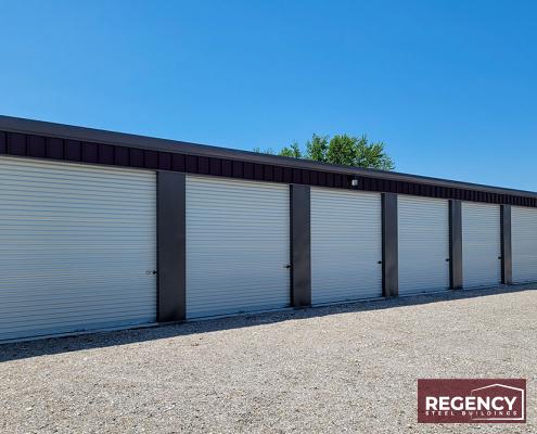 steel mini storage with large white doors