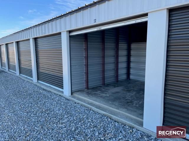 mini-storage-ohio pair of steel mini storage buildings in Alger, Ohio these buildings cater to residential and commercial storage needs. With Light Stone-colored walls and Bronze trim, the facility has an attractive appearance. The buildings feature customizations like gutters, downspouts, and DripX condensation control to ensure durability and protection against water damage. This self-storage facility will provide (86) much-needed storage units, meeting the increasing demand fueled by rising housing costs and remote work trends.