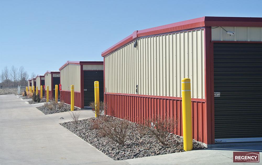 mini-storage-complex-wyoming a Self Storage Complex with red trim and broen doors with landscaping