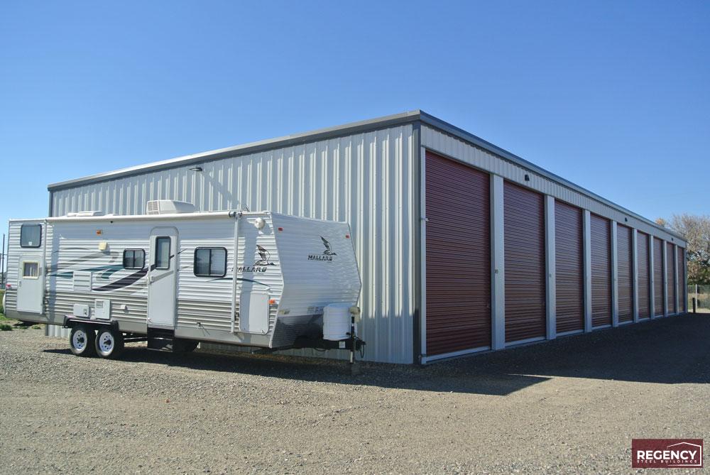 RV storage with a camper trailer posed for scale RV storage with a camper trailer posed for scale