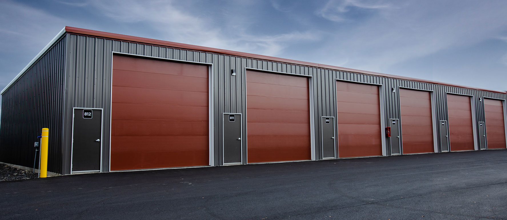 RV storage facility with large red doors